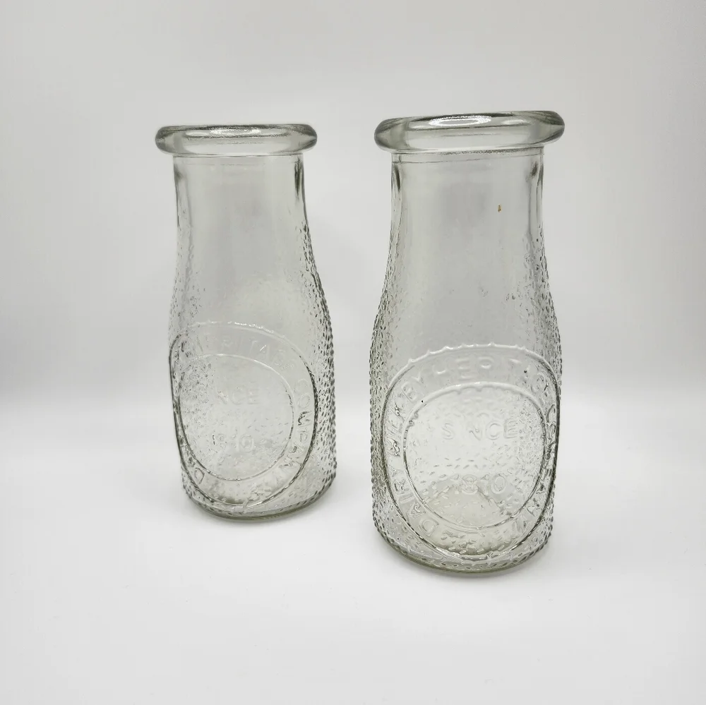 Set of two (2) Heritage Co. Vintage Milk Bottles. Roughly 5x3.5 inches. Cute! - Picture 1 of 5